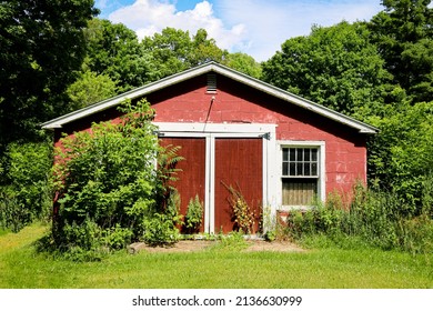 a brick red painted outdoors shed garage farm house building workshop farming shelter backyard