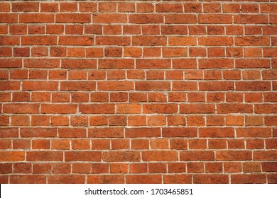 brick red wall. background of a old brick house. - Shutterstock ID 1703465851