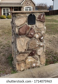 Brick Residential  USPS Mailbox In Front Yard.