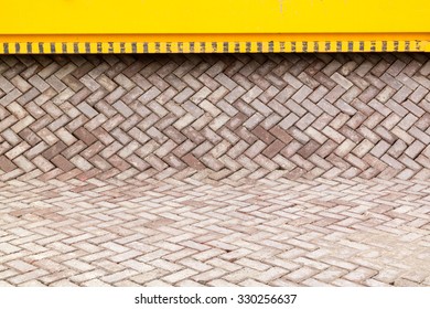 Brick Road Making Machine Laying Out A Carpet Of Bricks In Formation To Create New Paving On Road Or Street, Netherlands