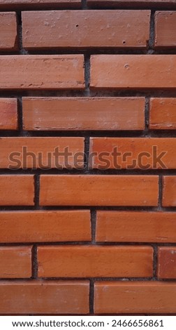 A brick is a type of construction material used to build walls, pavements, and other elements in masonry construction. Properly, the term brick denotes a unit primarily composed of clay, but is now al