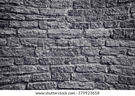 brick wall background, backdrop. old, vintage, textured stone.  Black and white image of depressed. bdsm.