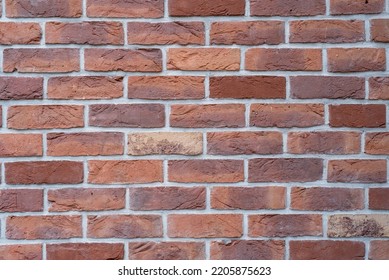 brick wall background, brick wall in red. Orange brick fence can be used as background. Modern red brick wall texture for background. Old dud wall with shadow texture can be use as background. - Shutterstock ID 2205875623