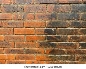 Brick Wall Before And After Pressure Washing To Clean Off The Dirt And Grime