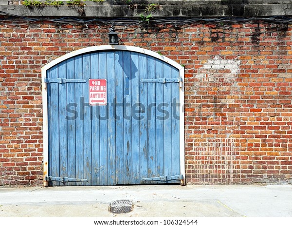 Brick Wall Blue Garage Doors New Stock Photo Edit Now 106324544