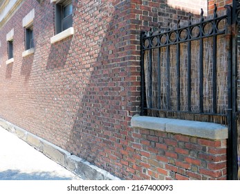 Brick Wall Building Rod Iron Gate Background Texture In Hoboken New Jersey NJ