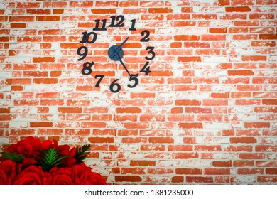 Brick wall with clock in cafe, background and copy space.