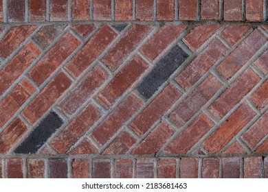 A brick wall with a diagonal bond texture background