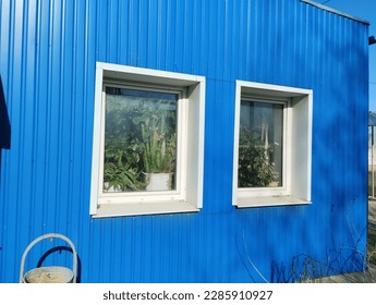brick wall facade with windows