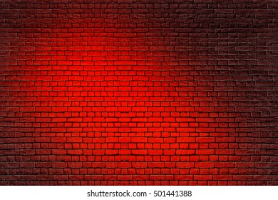 Brick wall fiery red background with light spot - Powered by Shutterstock