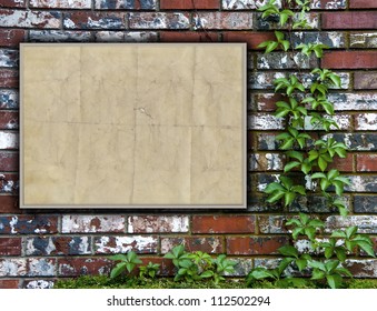 A Brick Wall With Ivy And A Community Bulletin Board