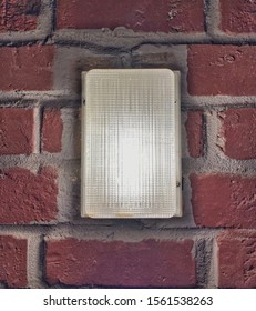 A brick wall with a light