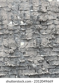 Brick wall with too much mortar - Shutterstock ID 2312049669