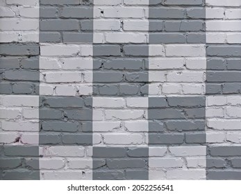 Brick wall painted in gray and white in checkerboard pattern as background or texture - Shutterstock ID 2052256541