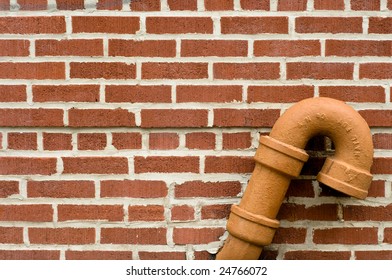 brick wall with pipe
