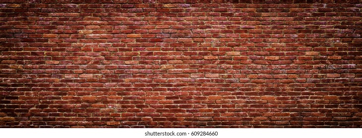 brick wall of red color, wide panorama of masonry - Shutterstock ID 609284660