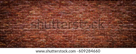 brick wall of red color, wide panorama of masonry