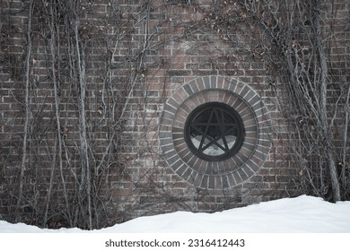 brick wall and round window