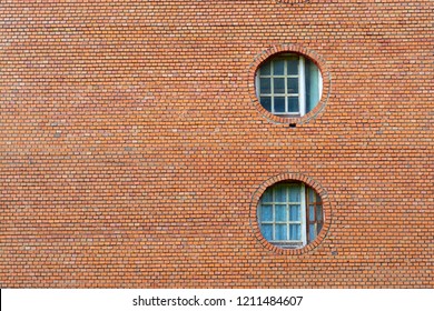 Brick wall with round windows