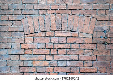 Brick Wall with Sealed Window Opening with Arched Top 