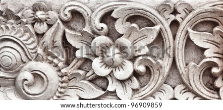 brick wall with stone carving