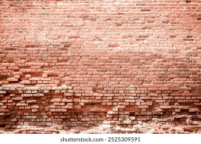 A brick wall is a sturdy structure made of bricks and mortar. It provides privacy, security, and aesthetic appeal to buildings. durability and timeless look.  indoors or outdoors, a brick wall