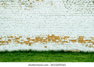 A brick wall is a sturdy structure made of bricks and mortar. It provides privacy, security, and aesthetic appeal to buildings. durability and timeless look.  indoors or outdoors, a brick wall