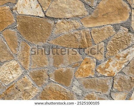Brick wall texture, closeup of an old exterior surface as a background. Building face wall, convex joint line between dissimilar faded bricks brings character and dimensionality to vintage masonry.