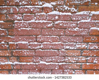 brick wall texture in the snow. red old brick in winter. Vintage brick wall covered in snow. texture background - Powered by Shutterstock