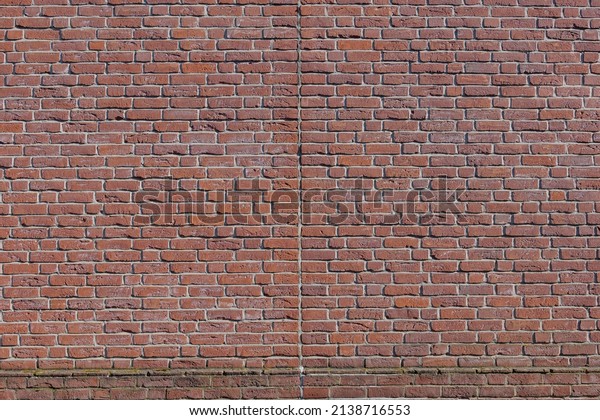 Brick\
wall texture with vertical gap separate the wall.\
