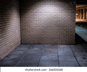 Brick Walls Of Deserted Street Alcove Corner Illuminated At Night