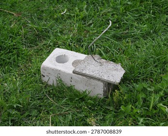 brick with wire for cladding a building. flexible bond brick