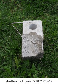 brick with wire for cladding a building. flexible bond brick