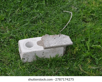 brick with wire for cladding a building. flexible bond brick