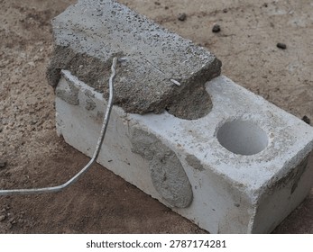 brick with wire for cladding a building. flexible bond brick