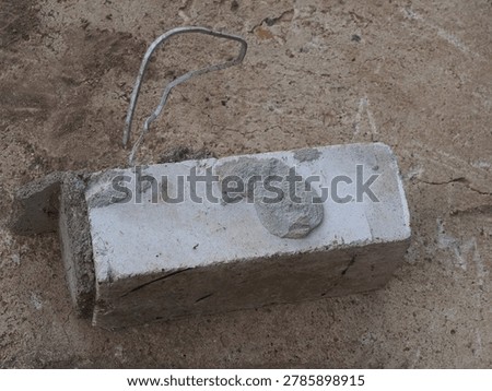 brick with wire for cladding a building. flexible bond brick