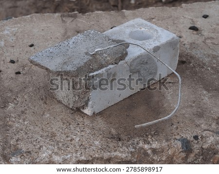brick with wire for cladding a building. flexible bond brick