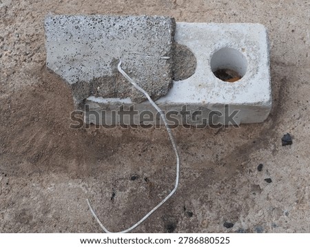 brick with wire for cladding a building. flexible bond brick