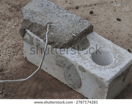 brick with wire for cladding a building. flexible bond brick