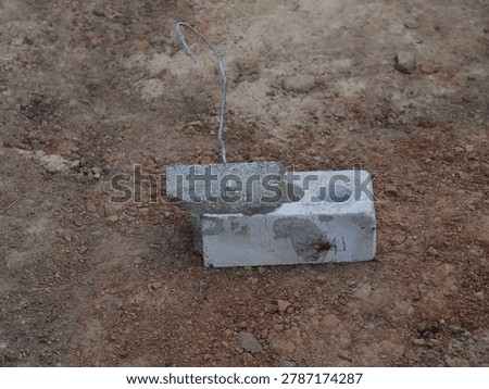 brick with wire for cladding a building. flexible bond brick