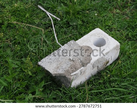 brick with wire for cladding a building. flexible bond brick