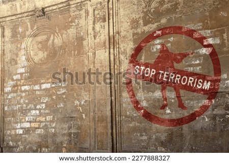 Bricked wall with stop terrorism sign