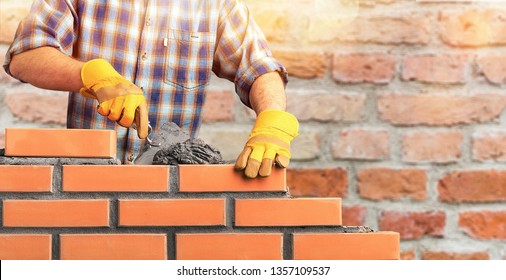 Bricklayer Industrial Worker Installing Brick Masonry