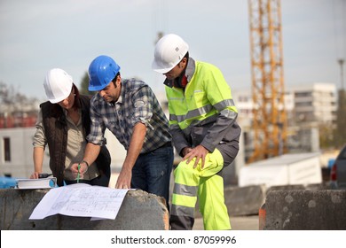 Bricklayers Outdoors With Foreman