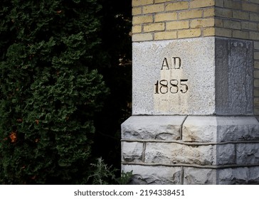 The bricks and cornerstone of a building built in 1885 stands in Manitowoc, Wisconsin.