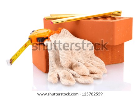 bricks, roulette and gloves isolated on white