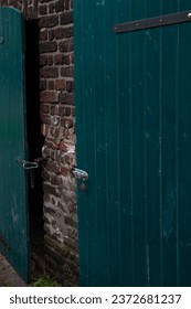 a brickwall with locked doors  