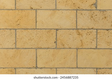 Brickwork brick masonry wall background architecture facade exterior building sand color limestone shellbrick.