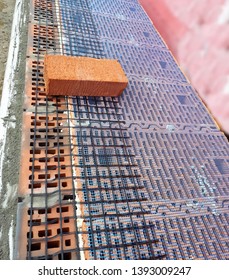 Brickwork With Reinforcing Basalt Mesh And Glass Cloth Mesh And Warm Pottery Blocks

