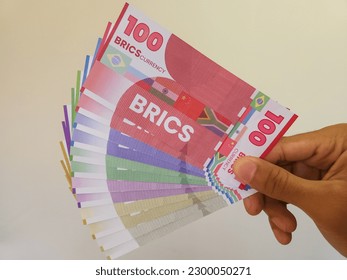 a BRICS currency illustration that Could Shake the Dollar’s Dominance - Shutterstock ID 2300050271